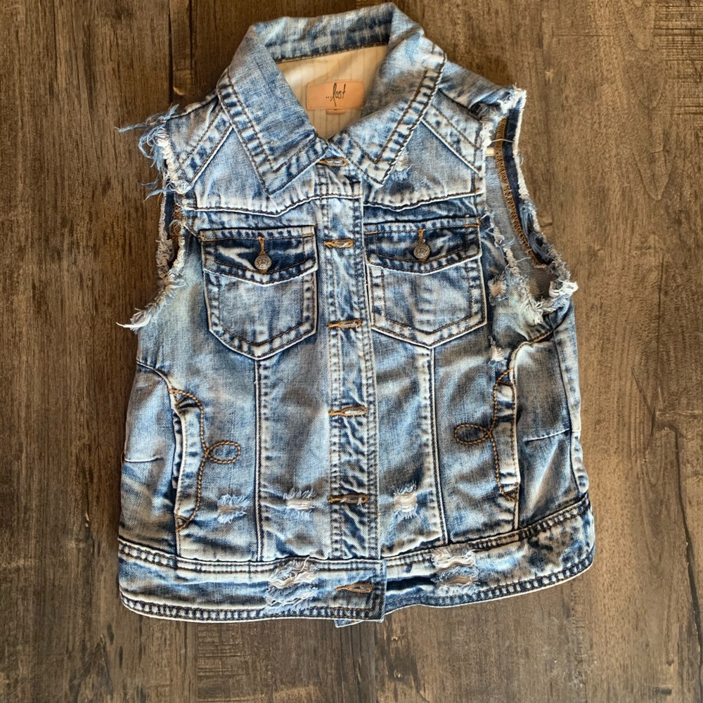 Distressed denim cut off vest